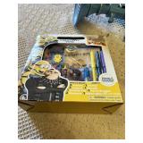 Despicable Me Themed Lot: Minion Piggy Bank, Light-up Fart Gun, Dressed Minion Figurine, and Activity Pack