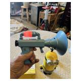 Despicable Me Themed Lot: Minion Piggy Bank, Light-up Fart Gun, Dressed Minion Figurine, and Activity Pack