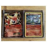 These are Pokemon trading cards featuring Victini-EX and Reshiram Holo Cards
