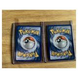 These are Pokemon trading cards featuring Victini-EX and Reshiram Holo Cards