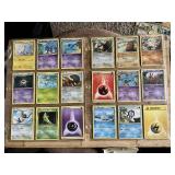 Lot of 18 Pokemon Trading Cards featuring multiple characters including Metapod, Swinub, Diglett, and others with various energy cards