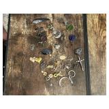 Assorted Charms and Pendants Including Crosses, Hearts, and Symbols