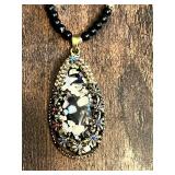 Beaded Necklace Collection including Black Beaded Necklace, Multicolor Stone Necklace, and Mask Pendant Necklace