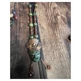Beaded Necklace Collection including Black Beaded Necklace, Multicolor Stone Necklace, and Mask Pendant Necklace