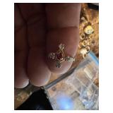 Vintage and costume ring collection including multi-stone band, solitaire rings, and gemstone accents