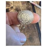 Lot of various silver and gold rings, including ornate designs and a large decorative shield-style ring and wolf insignia ring