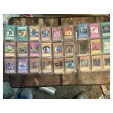 Lot of Yu-Gi-Oh! Trading Cards including Harpie Lady, Red-Eyes Dragon, and others