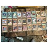 Lot of Yu-Gi-Oh! Trading Cards including Harpie Lady, Red-Eyes Dragon, and others