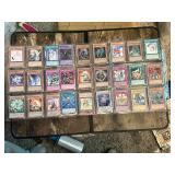 Lot of Yu-Gi-Oh! Trading Cards Including Various Monster, Spell, and Trap Cards, Cyber Dinosaur, Toon Mermaid and More