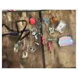 Collection of Keychains and Accessories Including Dice, Skull, and Name Tag Keychains Various Designs Miscellaneous