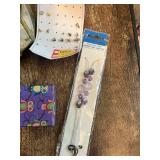 Assorted Jewelry Collection Including Earrings, Charms, and Accessories