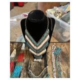 Collection of beaded necklaces and rosaries including multicolored designs