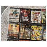 Lot of PlayStation 2 Video Games Including Madden NFL, Guitar Hero, and Tekken