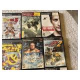 Lot of PlayStation 2 Video Games Including Madden NFL, Guitar Hero, and Tekken