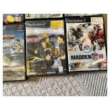 Lot of PlayStation 2 Video Games Including Madden NFL, Guitar Hero, and Tekken
