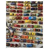 Collection of Hot Wheels Die-Cast Cars and Accessories