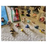 Disney Memorabilia Collection Featuring Mickey Mouse and Minnie Mouse Items, Figurines, and More