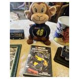 NASCAR Memorabilia Collection including Rusty Wallace Model Car, Corey LaJoie Autograph, NASCAR DVD, Monkey Plush, and Other Items