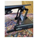 Lightly used Cube Corner 48 Varidesk Raising Desk for Sitting or standing