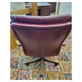 Solid used Leather Dest Chair on rollers