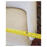 Highly collectable cushioned office chair on rollers