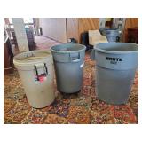 3 heavy duty Trashcans one with rollers