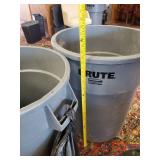 3 heavy duty Trashcans one with rollers
