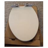 white elongated toilet seat with child seat insert and hardware