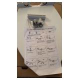 white elongated toilet seat with child seat insert and hardware