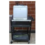 HP LASERJET 2600ON ON PLASTIC ROLLING CART