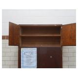 TALL WOODEN CUPBOARD