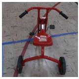 RED "LOCO MOTION" TRICYCLE