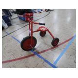 RED "LOCO MOTION" TRICYCLE