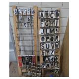 3 RACKS PLUS LOTS OF SELF REFLECTING LETTERS AND NUMBERS
