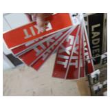 3 RACKS PLUS LOTS OF SELF REFLECTING LETTERS AND NUMBERS
