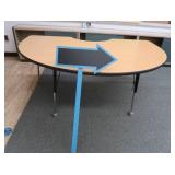LARGE KIDNEY SHAPED TABLE WITH SMALLER ARROW SIGN