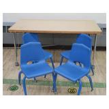 4 SMALL BLUE CHAIRS AND SMALLER WOOD RECTANGULAR TABLE