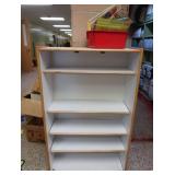 TALL WOODEN DRESSER & BOOKS