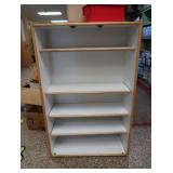 TALL WOODEN DRESSER & BOOKS