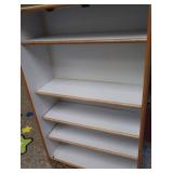 TALL WOODEN DRESSER & BOOKS