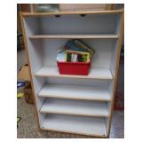 TALL WOODEN DRESSER & BOOKS