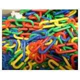 GREEN AND YELLOW TOTES FULL OF COLORFUL TOYS/CHAIN LINK TOY
