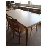 LARGE SOLID OAK TABLE AND 4 CHAIRS