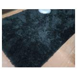 BLACK FUZZY RUG & COLORFUL RUG
