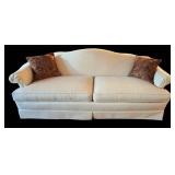 LR - Beige Upholstered Sofa With Throw Pillows