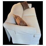 LR - Beige Upholstered Sofa With Throw Pillows