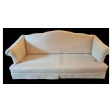 LR - Beige Upholstered Sofa With Throw Pillows