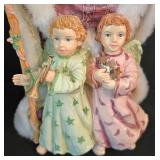 LR - Christmas Santa Figurines Pair With Children