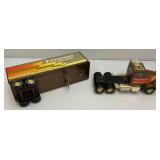 Two Vintage Nylint Pressed Steel Trucks Including Firestone Semi (Missing Pin For Trailer Hook Up) 25" And Nylint Racing Team Tow Truck (missing Tow Hook) 15"