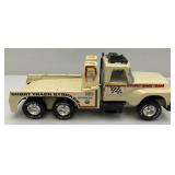 Two Vintage Nylint Pressed Steel Trucks Including Firestone Semi (Missing Pin For Trailer Hook Up) 25" And Nylint Racing Team Tow Truck (missing Tow Hook) 15"